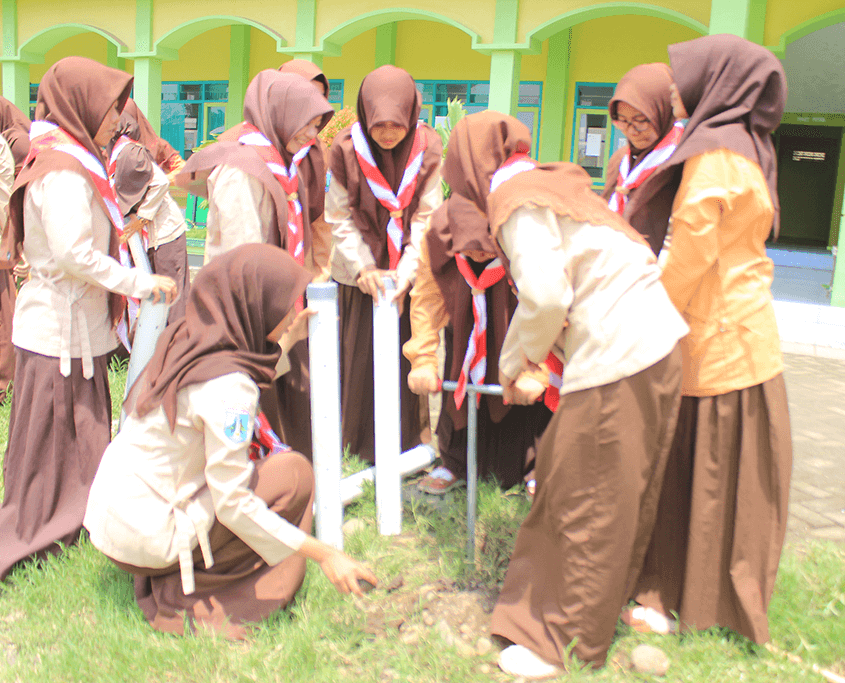 Aksi Lingkungan Sejuta Lubang Resapan Biopori Pramuka Universitas Nurul Jadid