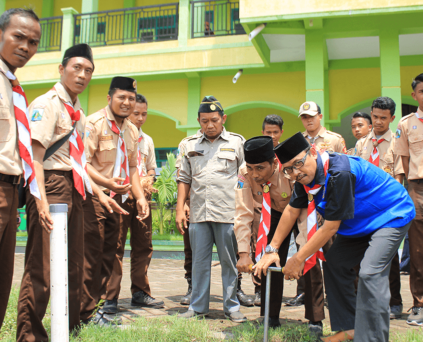 Aksi Lingkungan Sejuta Lubang Resapan Biopori Pramuka Universitas Nurul Jadid
