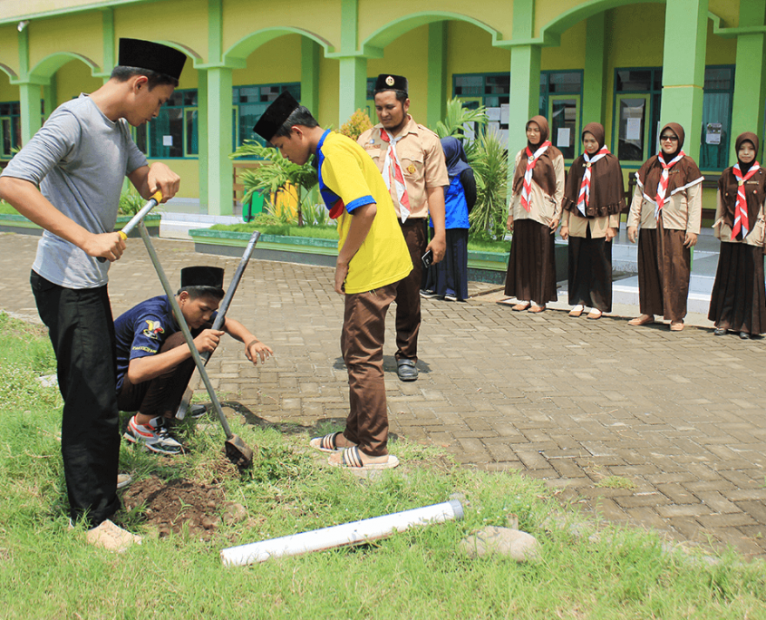 Aksi Lingkungan Sejuta Lubang Resapan Biopori Pramuka Universitas Nurul Jadid