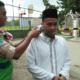 Saka Bakti Husada (kir)_ saat mengecek suhu tubuh salah satu guru yayasan